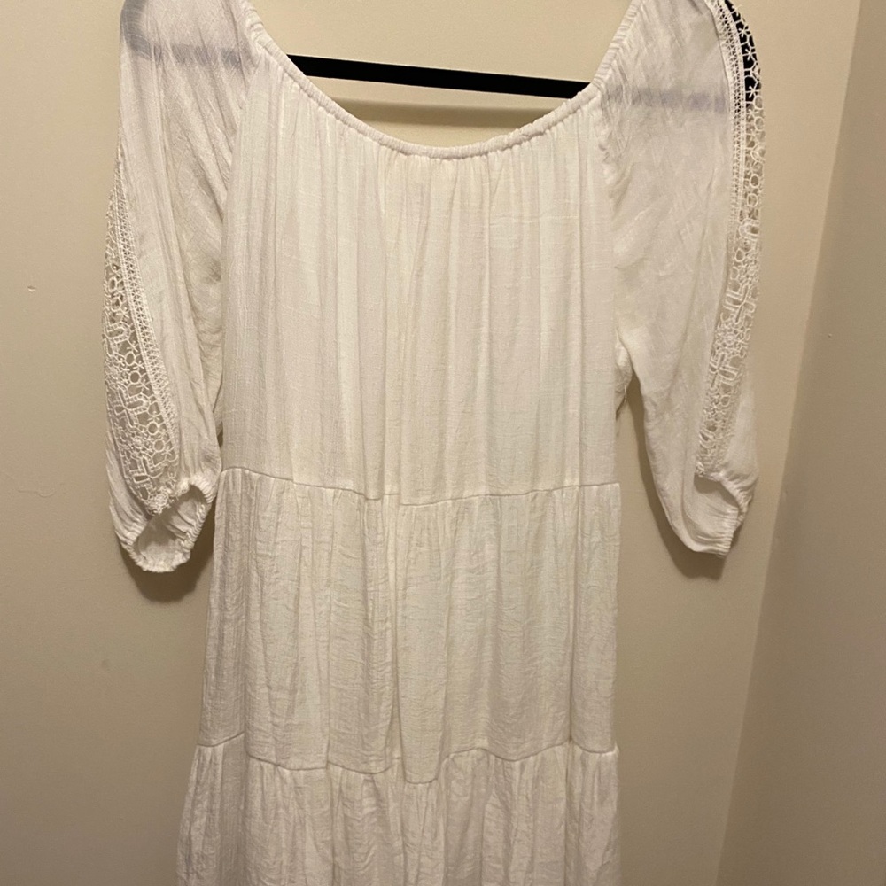 White, summer dress mid thigh to knee length.
